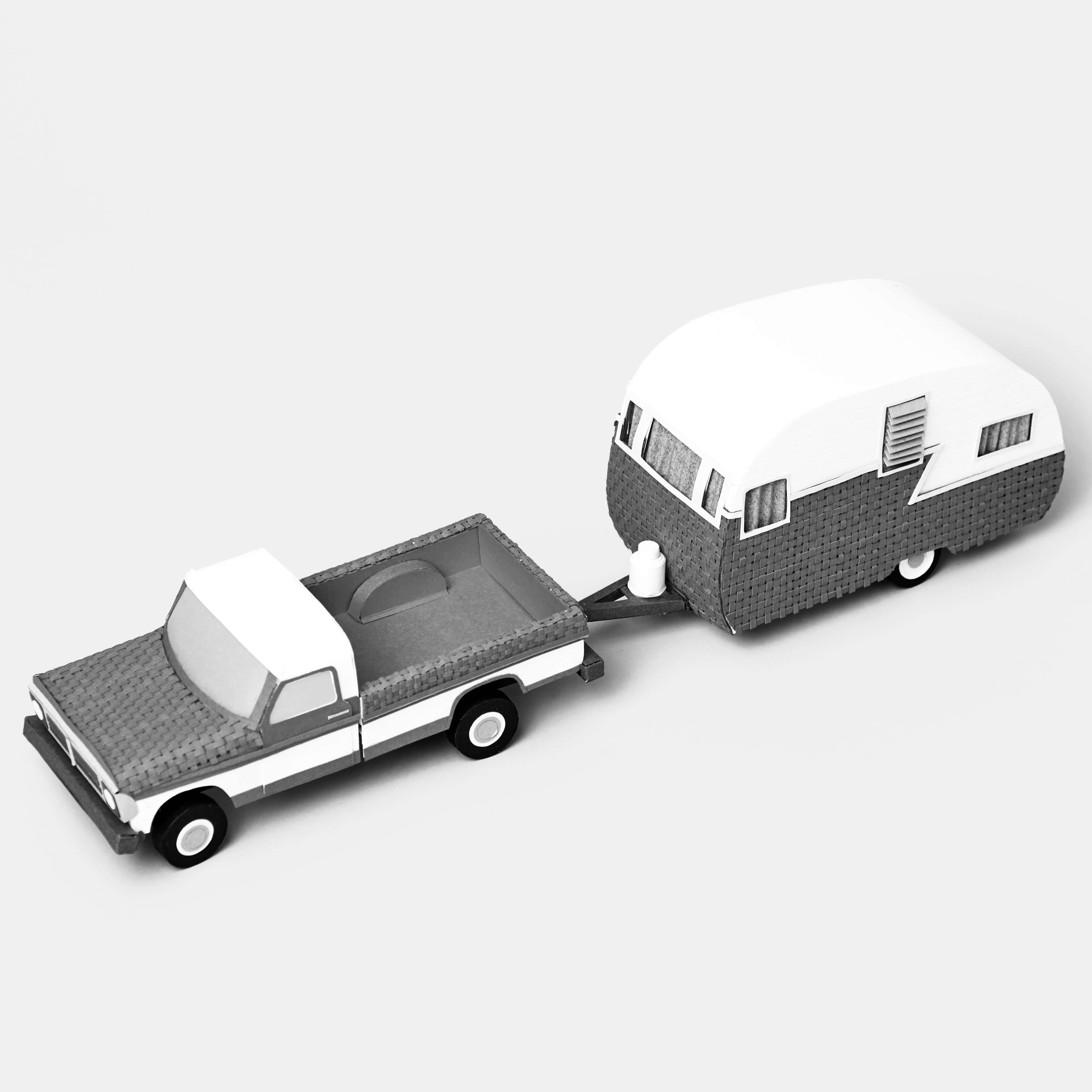 Paper craft model of a truck and camper